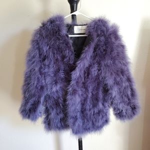 Feathered faux winter coat